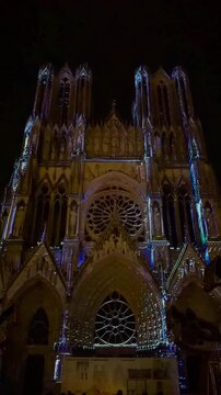 The light show Regalia on the facade of Reims Cathedral Notre-Dame de Reims. Reims, France, December 25, 2025. High quality 4k footage