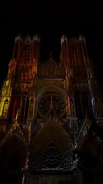 The light show Regalia on the facade of Reims Cathedral Notre-Dame de Reims. Reims, France, December 25, 2025. High quality 4k footage