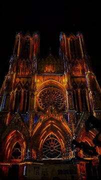 The light show Regalia on the facade of Reims Cathedral Notre-Dame de Reims. Reims, France, December 25, 2025. High quality 4k footage