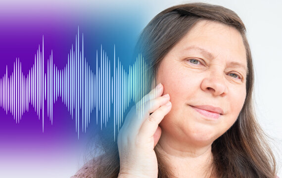 mature caucasian womans ear, sound wave, Hearing Test, ringing or buzzing sensation, Auditory impairment, tinnitus, Inflammation middle ear, acoustic trauma