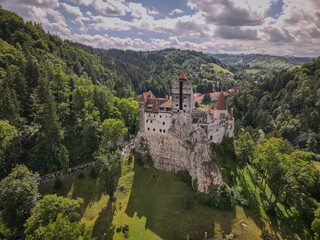Editorial Use Only - Bran Castle Perched on a Rocky Outcrop Surrounded by Green Forests © Greggory Zzyzx