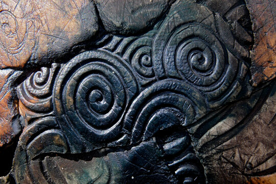 Closeup of Circular ceramic design.  Garden art