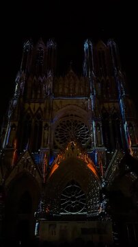 The light show Regalia on the facade of Reims Cathedral Notre-Dame de Reims. Reims, France, December 25, 2025. High quality 4k footage