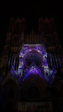 The light show Regalia on the facade of Reims Cathedral Notre-Dame de Reims. Reims, France, December 25, 2025. High quality 4k footage