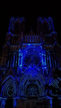 The light show Regalia on the facade of Reims Cathedral Notre-Dame de Reims. Reims, France, December 25, 2025. High quality 4k footage