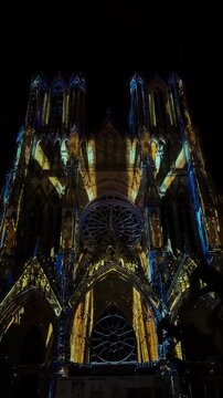 The light show Regalia on the facade of Reims Cathedral Notre-Dame de Reims. Reims, France, December 25, 2025. High quality 4k footage