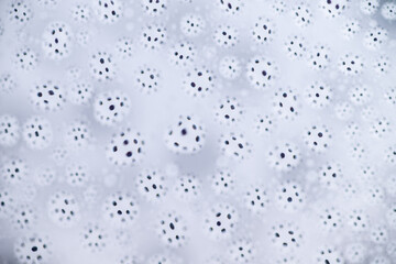 Close up of Black and White Abstract Water Drops on Glass Background © Anna Hoychuk
