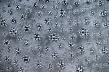 Close up of Black and White Abstract Water Drops on Glass Background © Anna Hoychuk