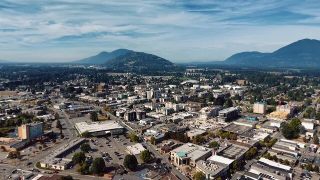 Aerial view of downtown Chilliwack with mountains, BC Canada