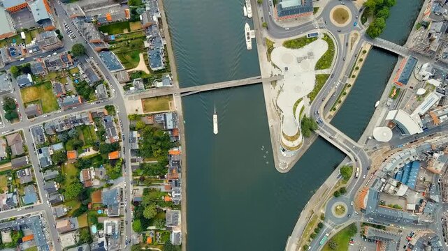 Namur, Belgium. The Citadel fortress dominating a rocky limestone spur overlooking the confluence of the Sambre and Meuse rivers, Drone footage under bright daylight. Drone footage