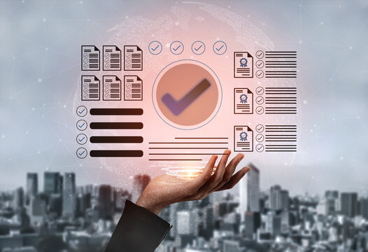 Modern business analytics concept featuring a hand displaying data visualization with checkmarks and document icons, set against a dynamic cityscape background. Gantry