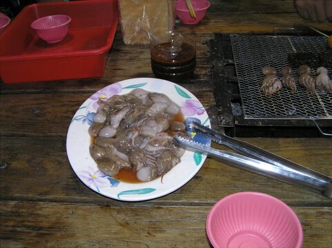 A Plate of Food on a Table with a Spat
