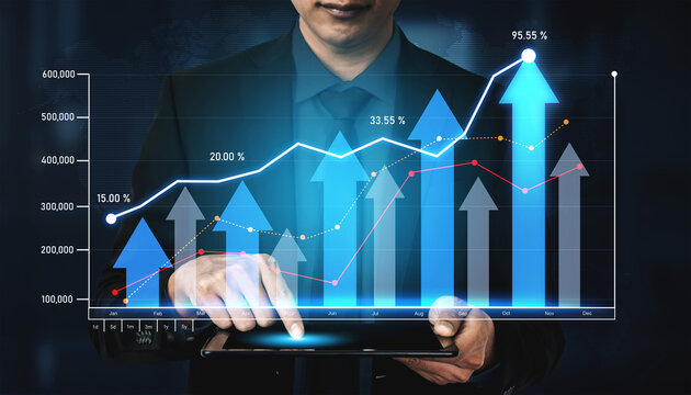 A businessman focused on analyzing financial data on a tablet, featuring dynamic graphs that indicate growth and progress in a modern business environment. Scalp
