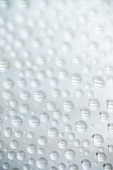 Close up of Black and White Abstract Water Drops on Glass Background © Anna Hoychuk