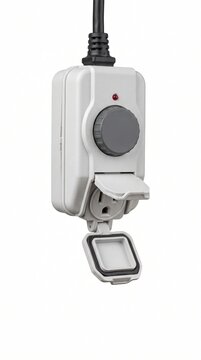 Outdoor electrical timer plug with a weather resistant cover and dial control is shown isolated on a white background for holiday lighting and garden equipment management.