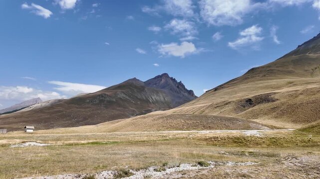 scenic view of the colle della maddalena, col de larche, mountain pass at 1991 meters elevation, connecting valle stura in piedmont, to the french alps. ideal for travel, transportation and nature 