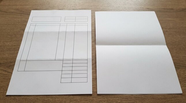 Customer invoice beside a folded terms extension request &ndash; Invoice Management Concept, workplace still life for financial services and accounting