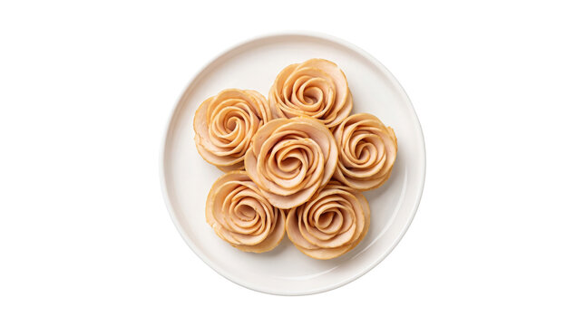 Gourmet rose shaped butter swirls on white plate, elegant floral butter rosettes for fine dining, decorative cream colored butter flowers