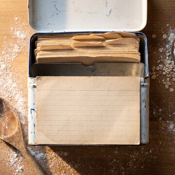 Retro enamel recipe tin with blank lined card and flour
