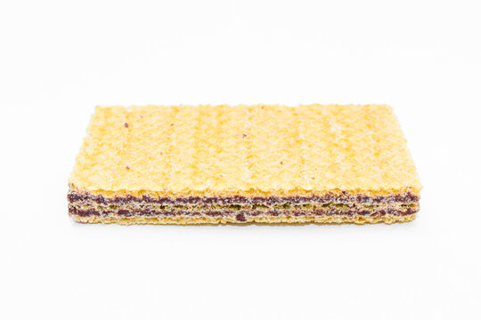 A rectangular chocolate wafer biscuits, featuring multiple crisp wafer layers with rich chocolate cream filling, isolated on a white background