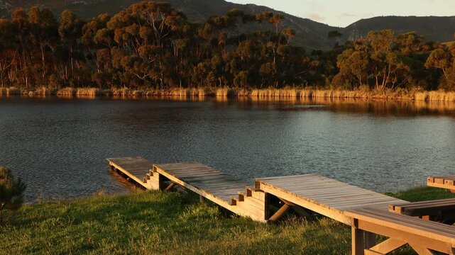 wooden launch over pond at sunset, Stanford, South Africa