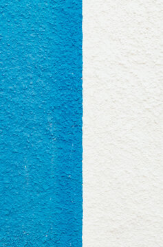 Beautiful view of the street wall with relief decoration of the blue and white building.