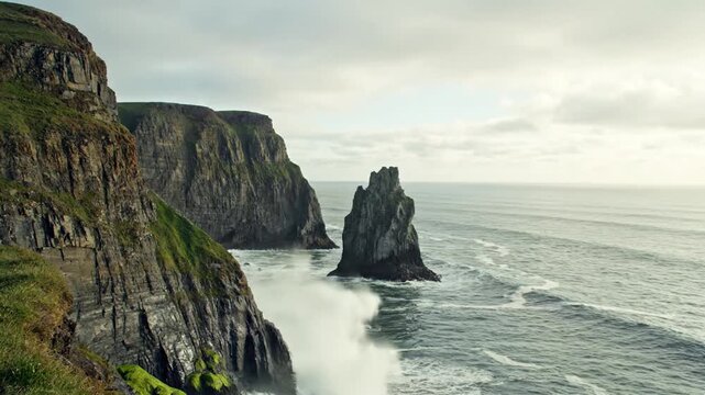 Rugged coastal cliffs rising above a turbulent ocean sea