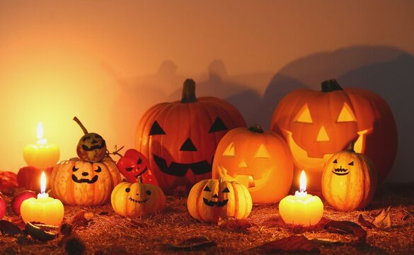 Halloween pumpkin display with glowing candles