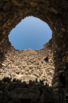 Italy, Sardinia, Barumini.  Monumental quadrilobate Nuraghic complex dating to 14th century BC.  A UNESCO World Heritage site.