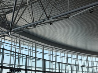 Metal space frame roof structure and truss system on an indoor ceiling © Denny