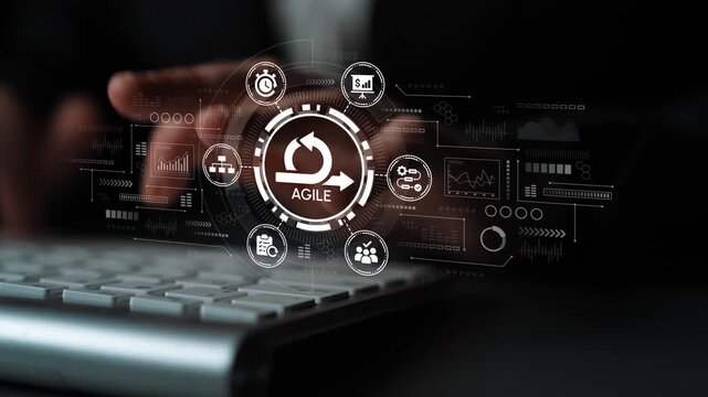 Hands Typing on Keyboard with Agile Methodology Icons and Data Visualization in a Modern Business Environment. Entropy.