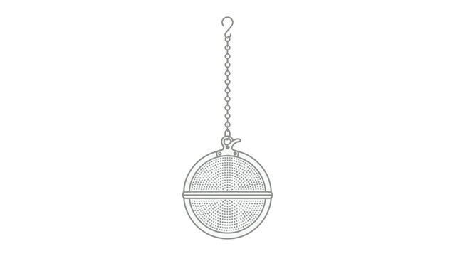 Tea Infuser Sphere: A delicate metal sphere tea infuser, designed for steeping loose leaf tea, hangs suspended by a fine chain, ready for its next aromatic brew.