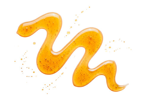 Golden honey syrup swirl or cosmetic gel smear isolated on black background