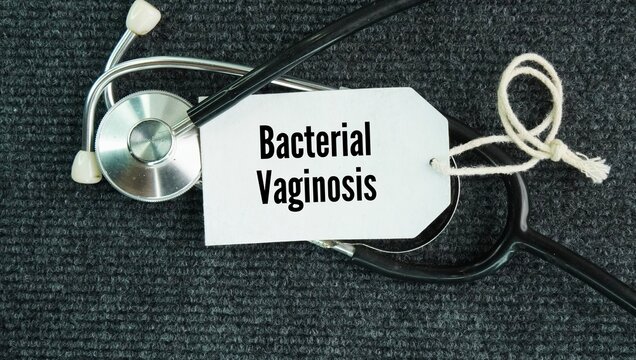 Stethoscope and paper tag with the word Bacterial vaginosis. very common vaginal condition caused by an imbalance of the natural bacteria in the vagina