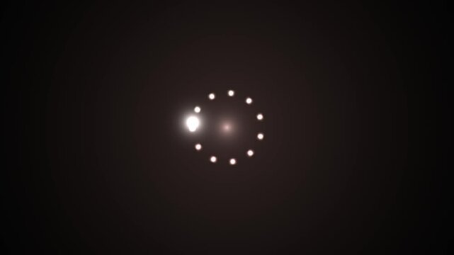 Circular loading animation progress indicator with glowing dots spinning clockwise on a dark background, representing data processing, waiting, or system activity.
