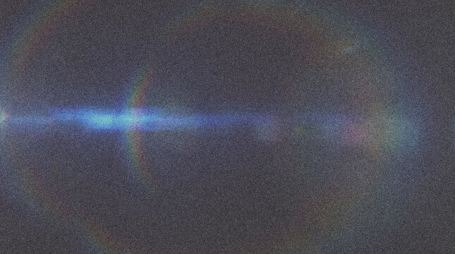 Grainy horizontal lens flare with rainbow diffraction rings