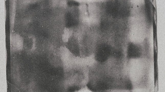 Distressed black and white film texture with heavy grain and scratches