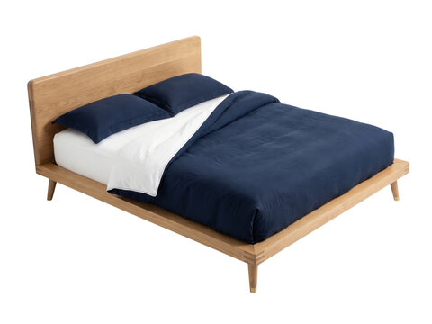 Modern wooden bed frame with navy blue bedding isolated on transparent background