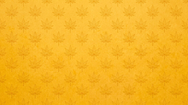 Seamless pattern with cannabis leaves on a yellow textured background