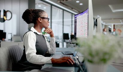 Association Manager Updates Membership Database On Laptop