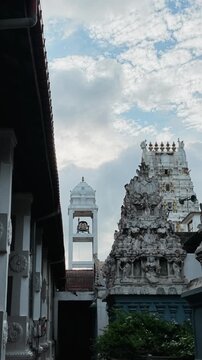 Ornate sculptural fa&ccedil;ade of Munneswaram Hindu Temple rising against a blue sky in Chilaw, Sri Lanka.