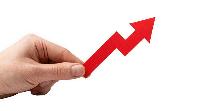 Hand holding a red zigzag arrow pointing upwards to demonstrate financial growth, positive development, and successful business progress.