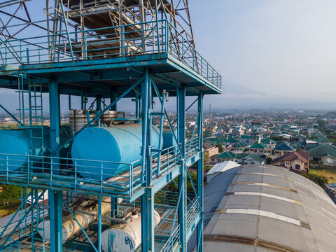 Industrial Water Treatment and Storage Tanks Featuring a Blue Steel Framework, Industrial Infrastructure View from Above.