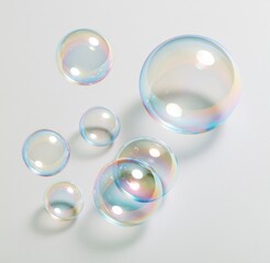 Fototapeta premium Colorful soap bubbles floating against white background
