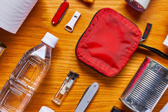 Disaster Preparedness Kit on Wooden Table