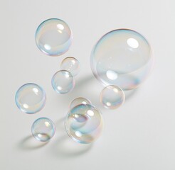 Fototapeta premium Colorful iridescent soap bubbles on white background