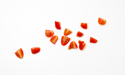 Fototapeta premium Chopped tomato isolated, cherry tomatoes