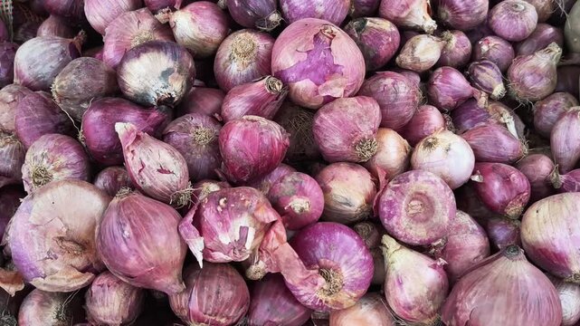 Top View of Harvested Organic Onions in a Vegetable Market for Selling