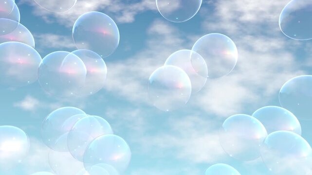 Abstract soap bubbles floating against blue sky with white clouds background in slow motion.