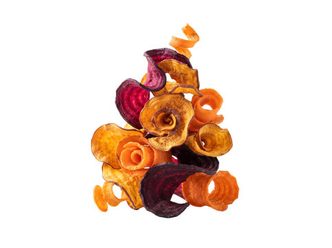 Gourmet vegetable chips stack, colorful beetroot and sweet potato crisps, healthy organic root vegetable snacks isolated on white background